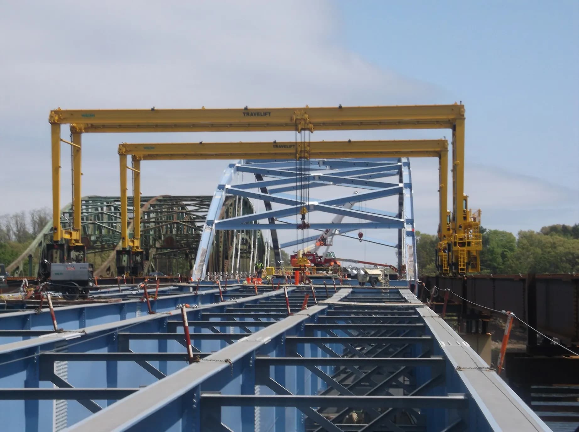 Steel plate girders being placed by gantry during bridge erection